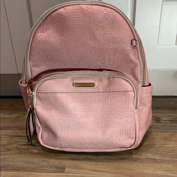 Juicy Couture Handbags - Juicy Couture Embossed Pink Backpack